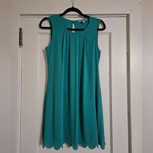 Sleeveless Shear Aline mini dress with keyhole button back Size Small
